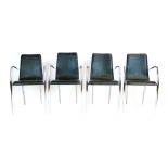 A set of four 1980's Danish armchairs with black vinyl seats and chrome frames CONDITION REPORT: