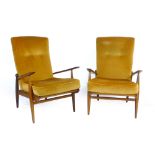 A pair of British 1960s teak and button up upholstered lounge armchairs CONDITION REPORT:
