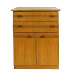 A White & Newton teak and crossbanded cabinet with two drawers over two doors, w. 57 cm CONDITION