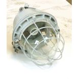 An East German industrial ceiling light with steel grill and moulded glass shade CONDITION REPORT: