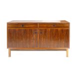A 1960's rosewood sideboard with two doors and two drawers on square straight feet, l. 135 cm