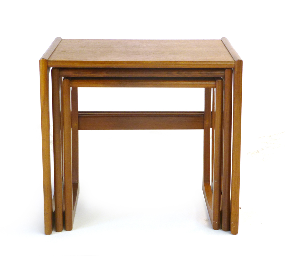 A nest of three G-Plan teak coffee tables, max l. 53 cm CONDITION REPORT: Some water marks and