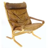 Ingmar Relling for Westnofa, a beech framed and tan leather 'Siesta' armchair  CONDITION REPORT: