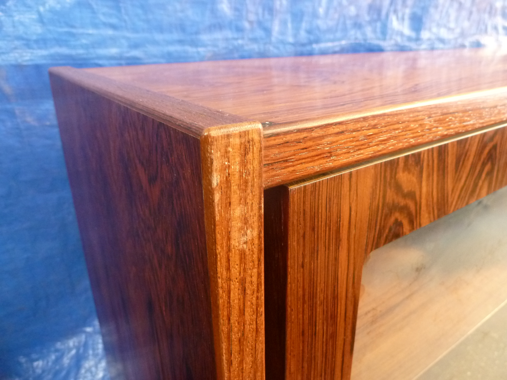 A 1960's rosewood bookcase with twin glazed sliding doors and six adjustable shelves on circular - Image 9 of 13