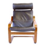 An Ikea bentwood and brown faux leather lounge chair with a matching footstool CONDITION REPORT: