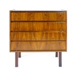 A 1960's rosewood chest of four drawers with integral handles on square straight feet, w. 80 cm