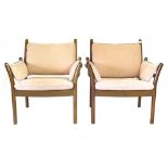 Illum Wikkelso for CFC Silkeborg, a pair of stained beech armchairs with pale pink loose cushions