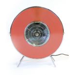 A 1970's Sofono electric heater of circular form with pink and white enamelling CONDITION REPORT: