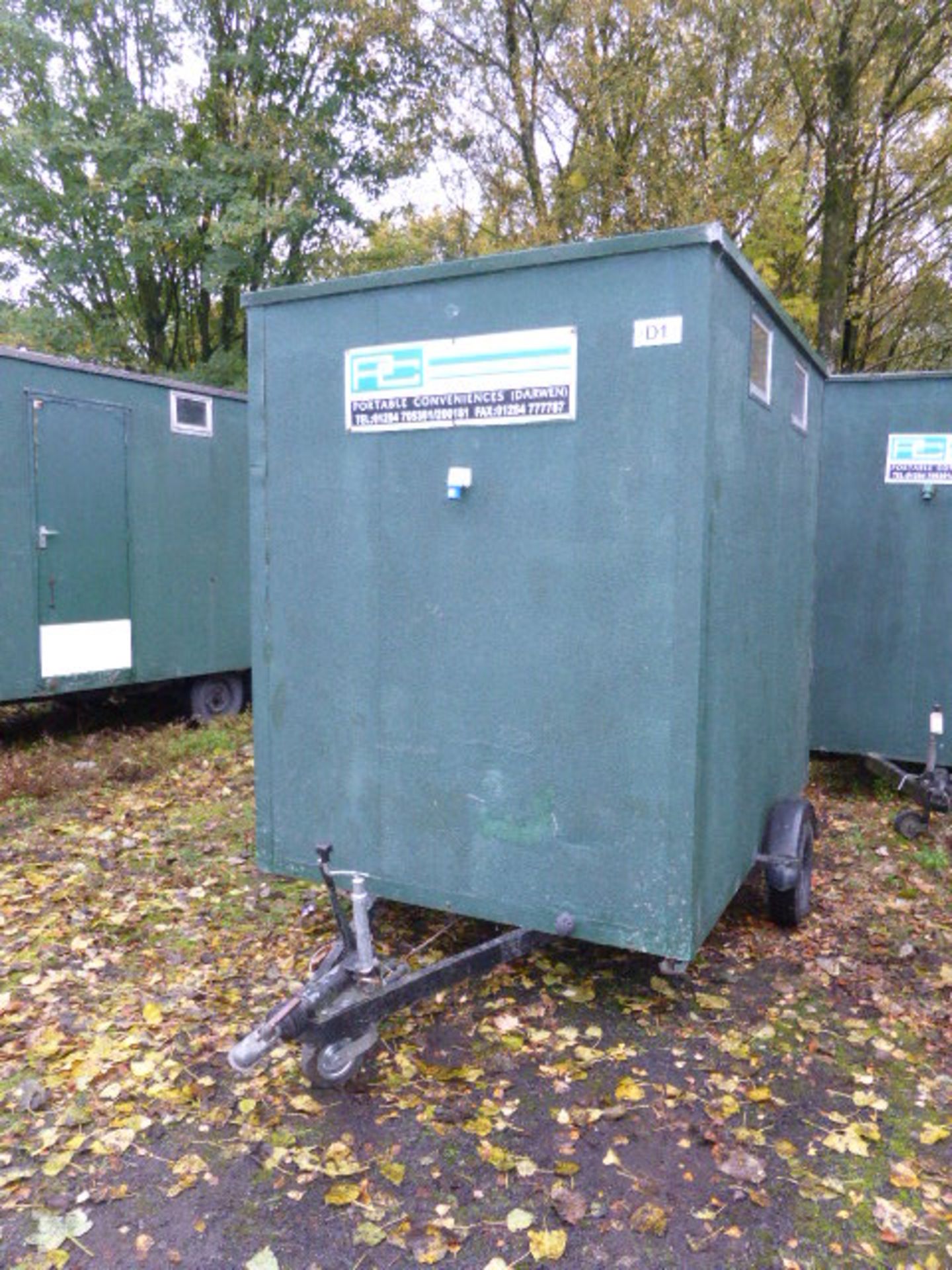 Single axle unisex disable toilet trailer with ramp access and handrails in green rough cast