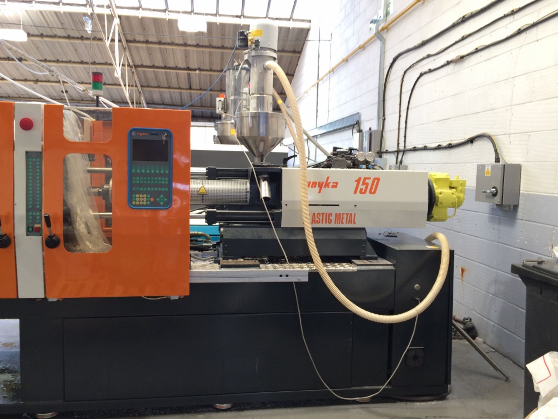 NPM Plastic metal Unyka 150 Injection Moulding Machine with Hopper Loader (2010) - Image 2 of 5