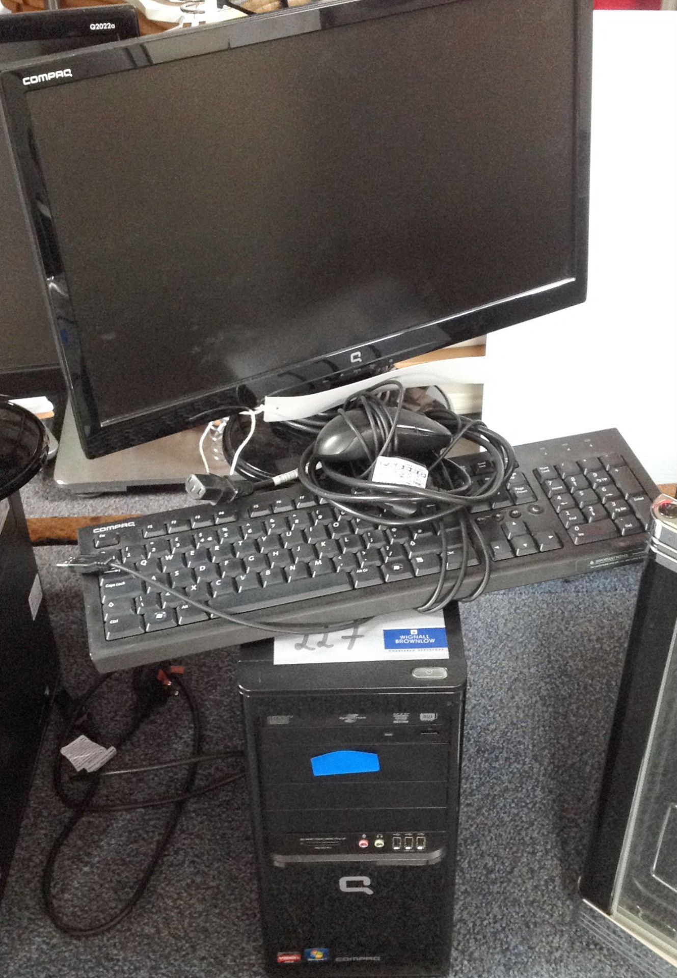 A Compaq SG3 Personal Computer with Flatscreen Monitor and Keyboard.