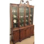 Turn of the 20 Century Walnut Breakfront Bookcase with Swan neck Pediment