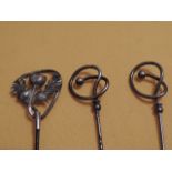 Lot of 3 silver headed hat pins.