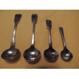 Lot of 4 silver spoons.