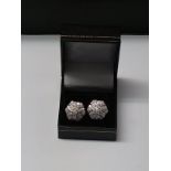 A stunning pair of 9K White Gold Earrings with 86 Cut Diamonds giving 0.640ct. Weight 4.55g.