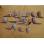 15 victorian clay pipes.