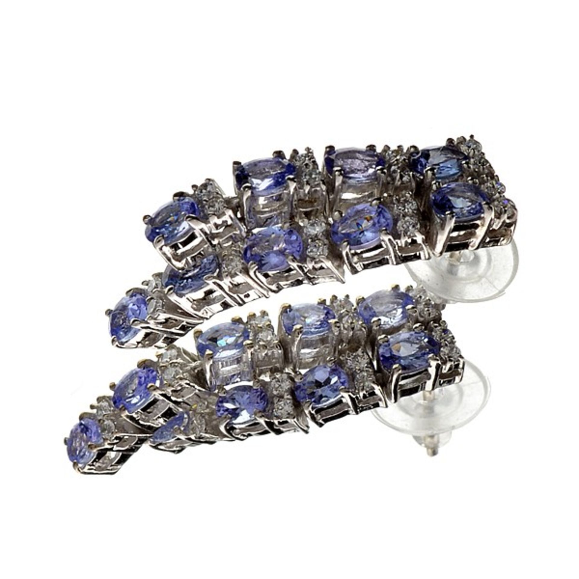 18 x Tanzanite gemstones - 3.56 carats. Appraisal value $3,220.00 approx £2,111.79