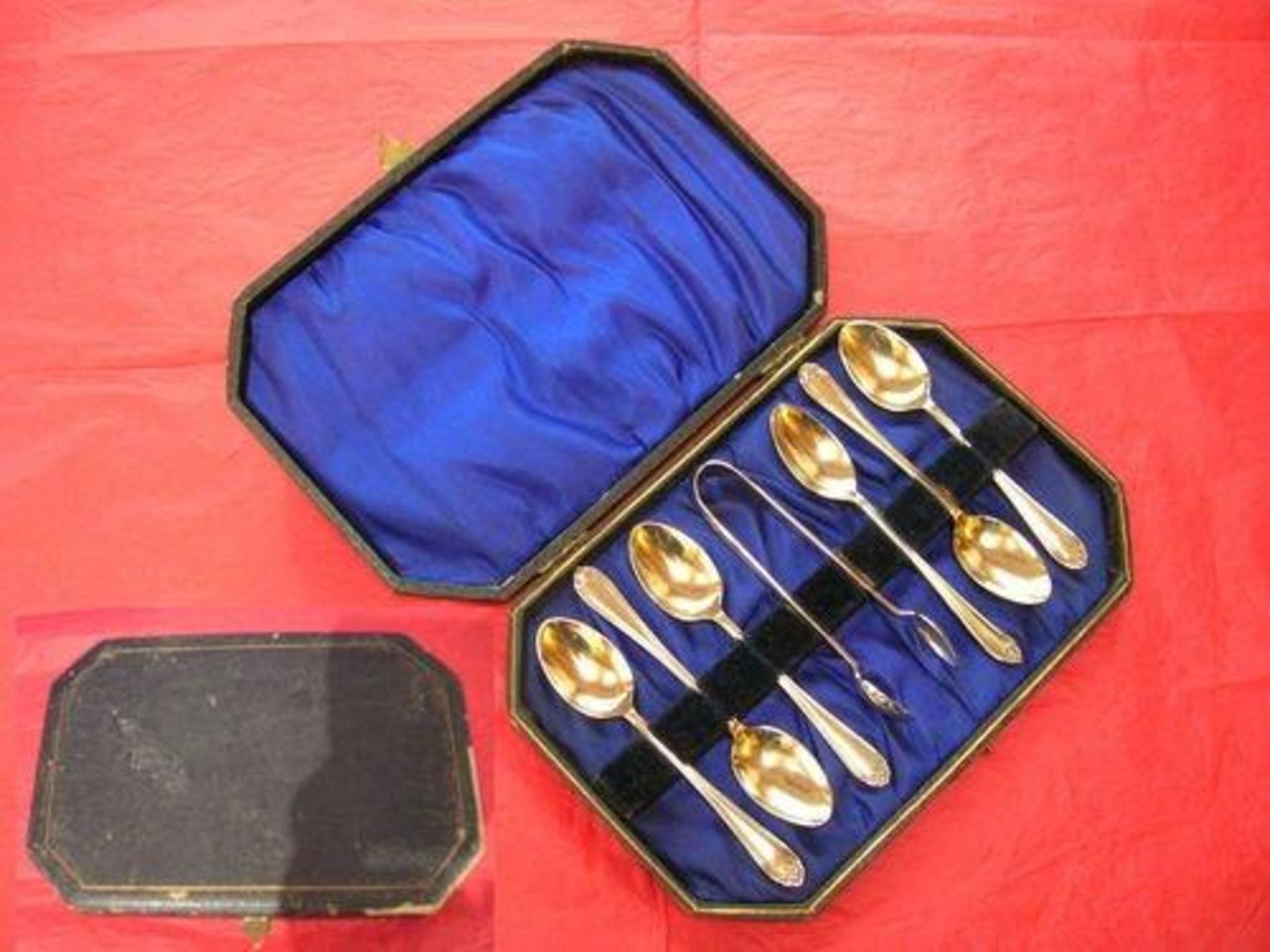 Case of Six S/P Spoons and Sugar Nips c1930's