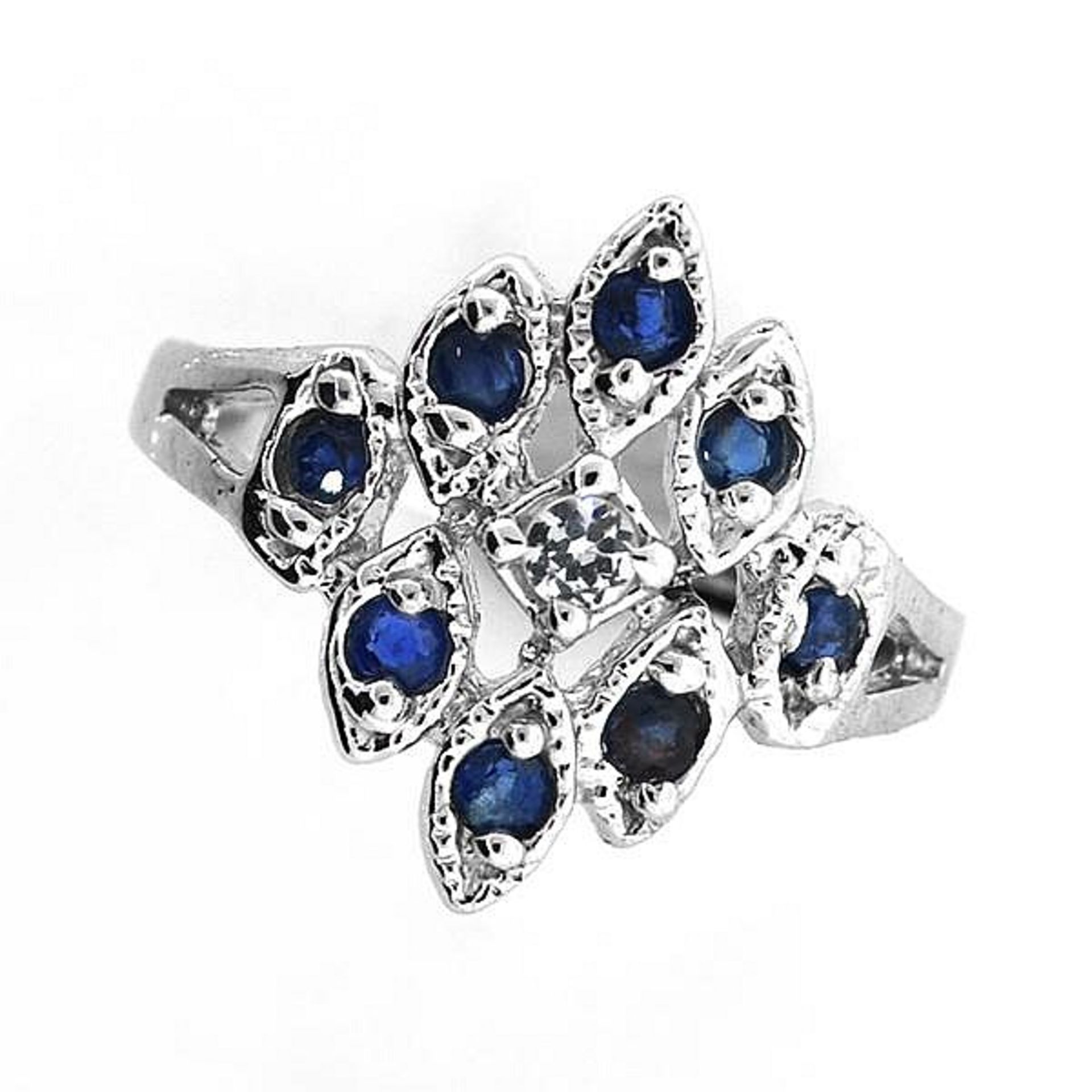 Designer Sebastian 8 x Round Cut Blue Sapphires = 0.40 carat And 1x round cut Topaz = 0.15 carat