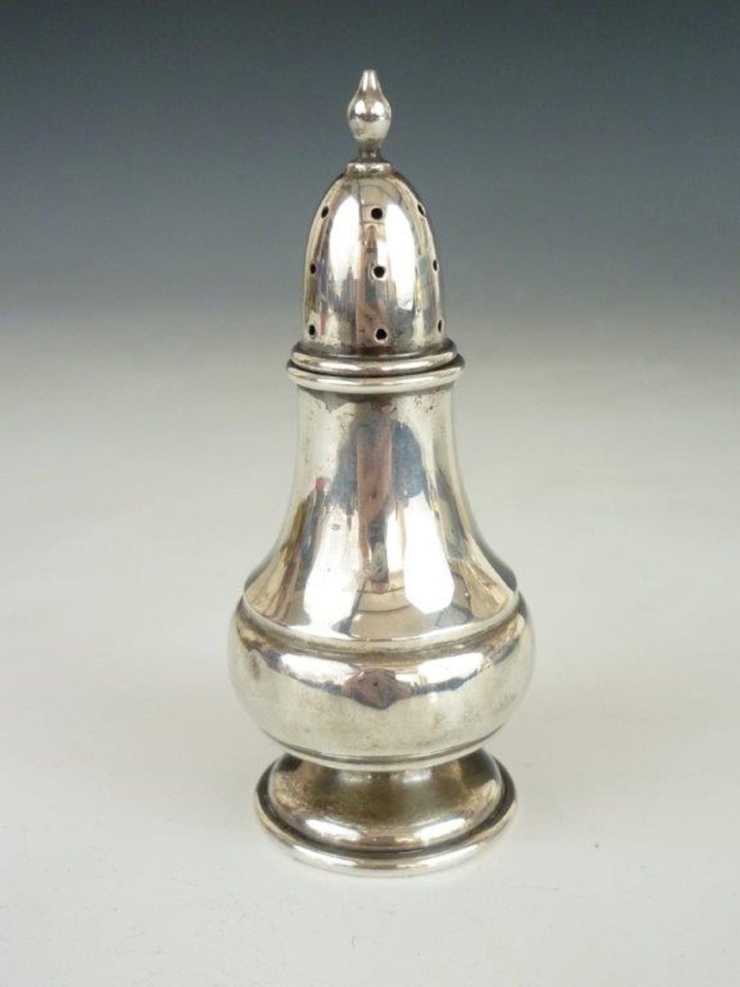 A 20th Century  Sterling Silver  Baluster 
Pepperette.  Marked Sterling.  36 g.