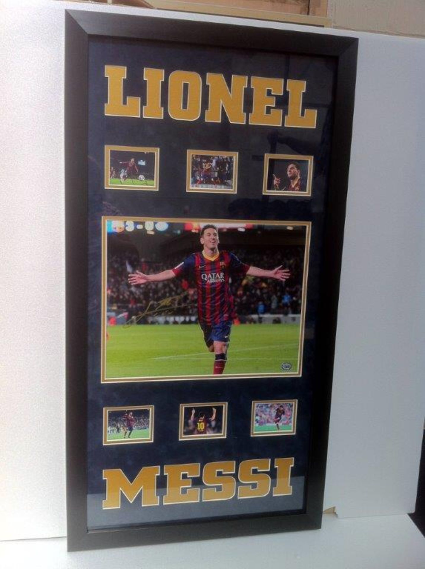 LIONEL MESSI signed photo with name cutouts and smaller photo montage.  Estimated value Â£250+.