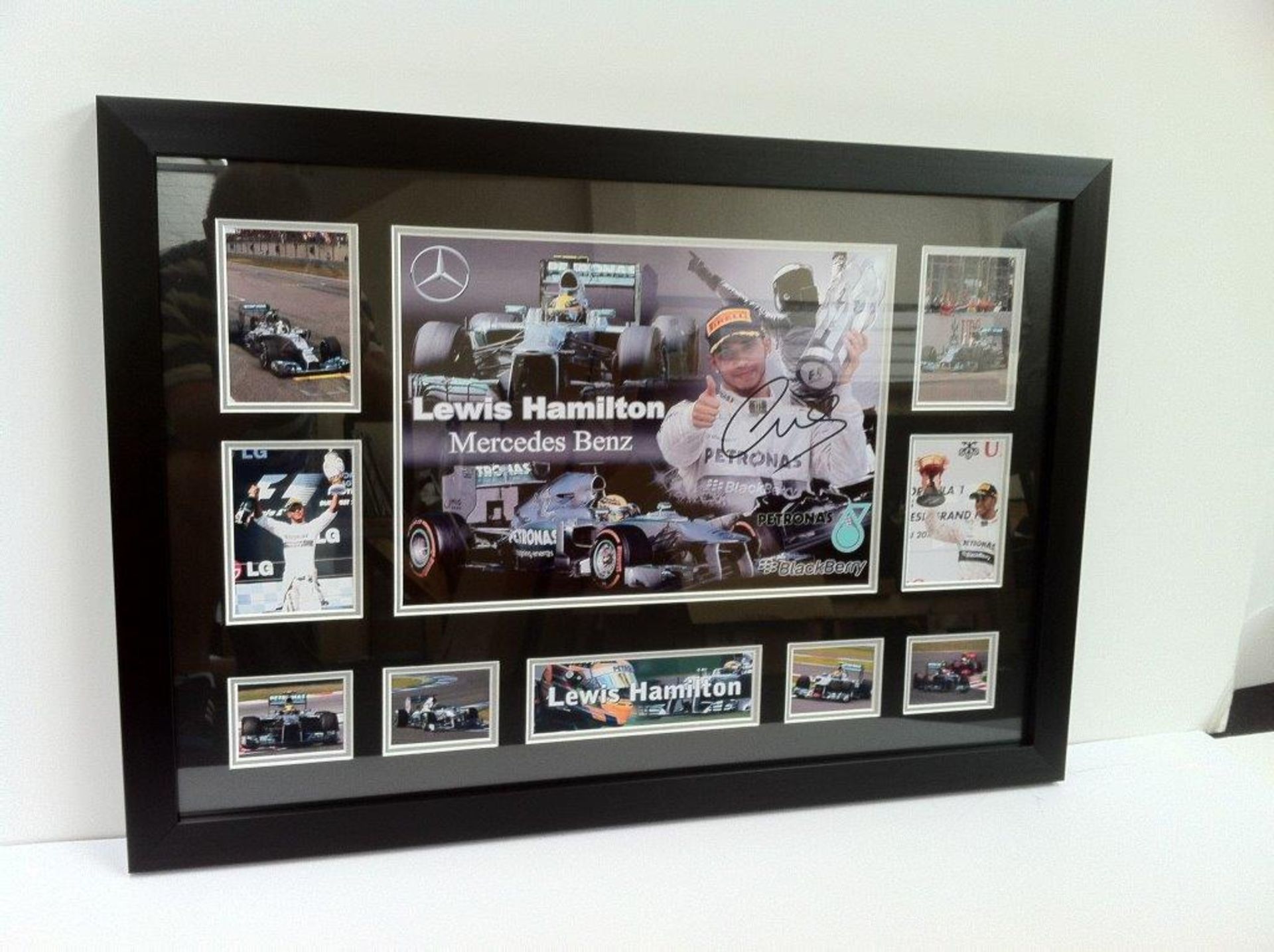 LEWIS HAMILTON landscape montage black outer mount with silver inner, black frame, approx size 22x32