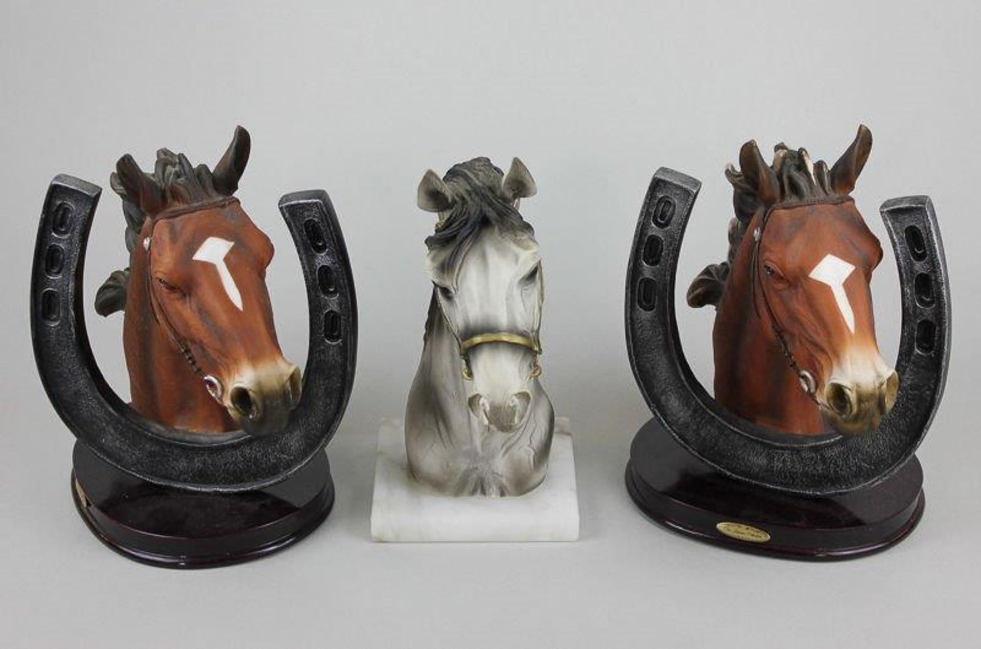 Pair Juliana Horses in Horseshoe Frames plus one.
23cms high - onyx/marble base