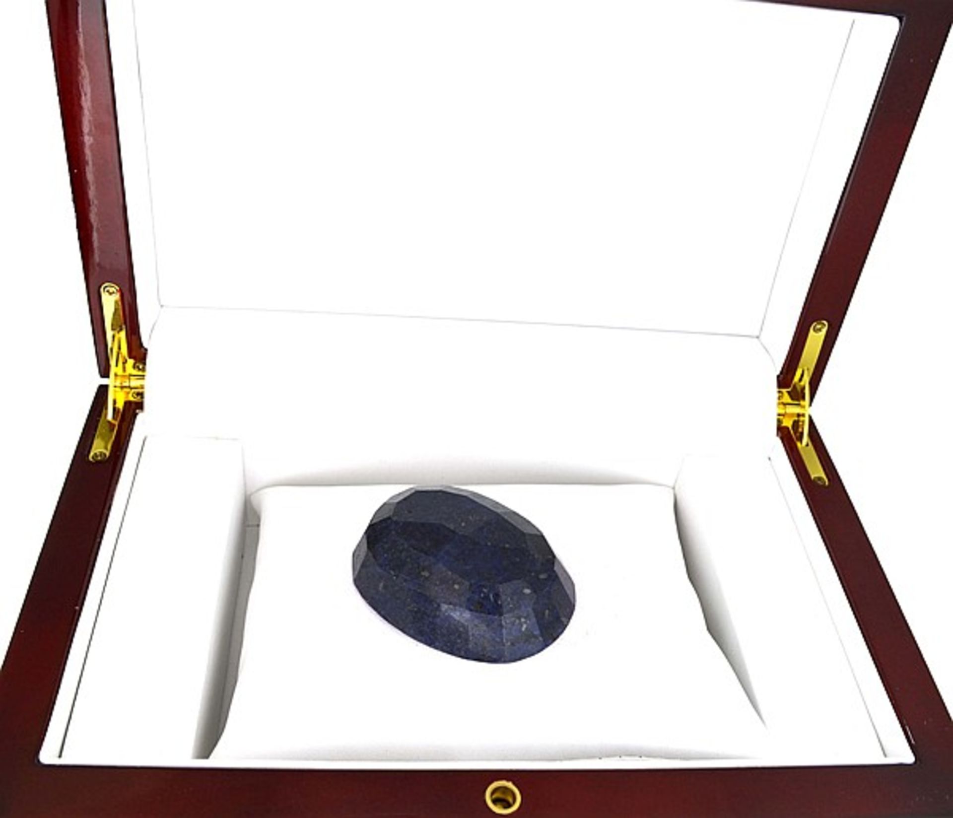 A Midnight Blue Oval Cut Blue Sapphire Gemstone = 465.50 carat, measures 5.31cm x 3.92cm x 2.10cm