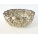 wiIndian White Metal Centre Bowl of shaped form
with pierced leaf decoration  37cms wideth pierced