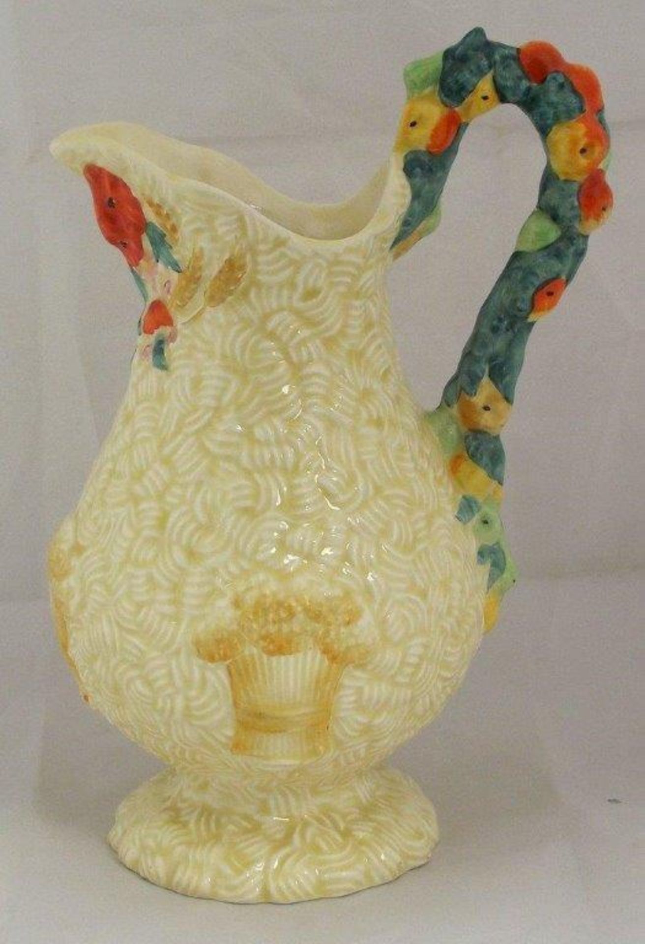 Clarice Cliff Art Deco Celtic Harvest Jug
Circa - 1937  9 inches tall.  Signed Clarice
Cliffe