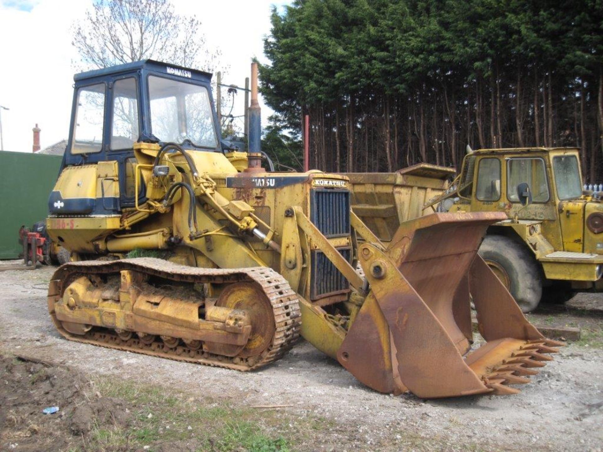 Komatsu Tracked Loading Shovel_x00D_
Good condition for age, 4 in 1 bucket with teeth and good - Image 3 of 6
