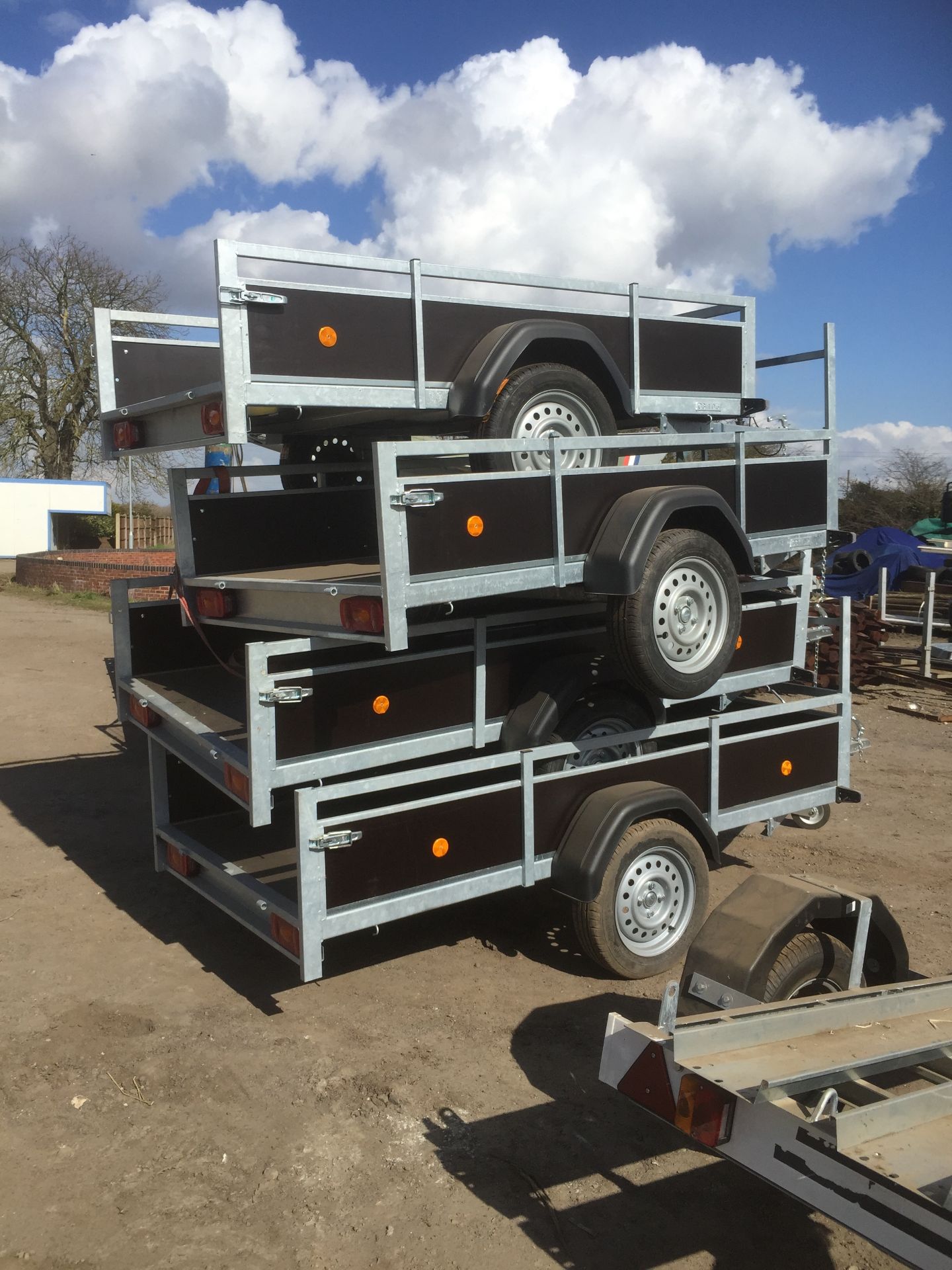 Brand New 7ft 4” trailer with drop down tail gates and hard wired lighting. Acorn Trailer, full