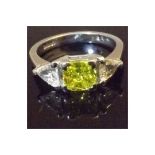 Fancy Vivid Yellow Diamond Ring, Diamond is Certified. 0.81 carat Yellow Diamond.