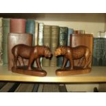 Nice pair of Leopard carved wooden book ends in good condition.