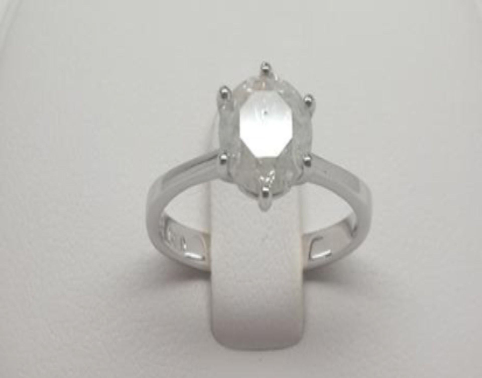 A 1.5 Carat Solitaire Diamond Set in 14k white gold. A single stone set in a classic siz claw