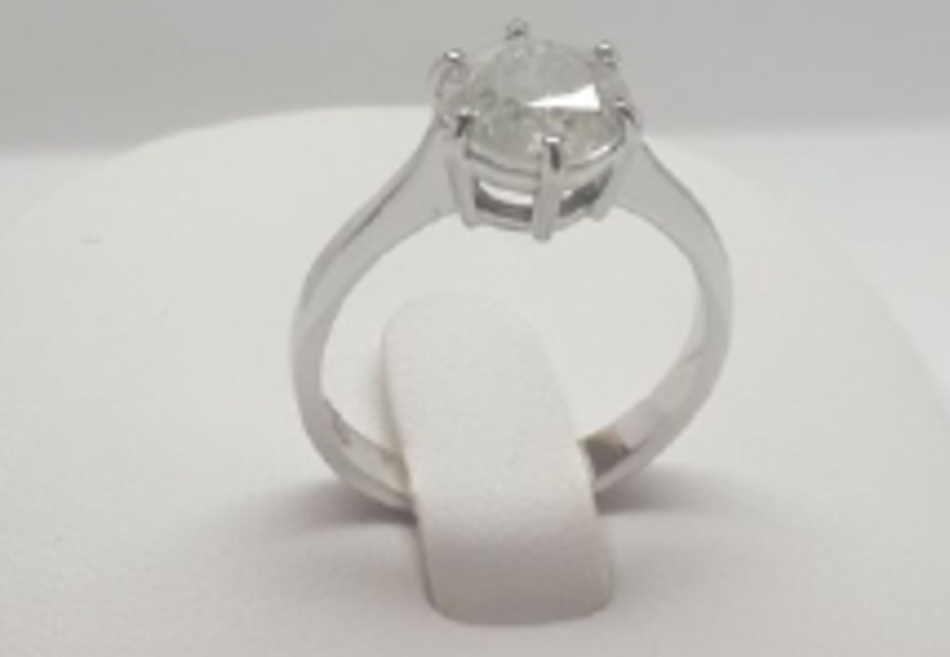 A 2 Carat Solitaire Diamond Set in 14k white gold. A single stone set in a classic siz claw setting