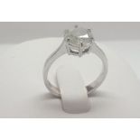 A 2 Carat Solitaire Diamond Set in 14k white gold. A single stone set in a classic siz claw setting