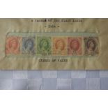 A collection of 6 Rhodesian & Nyasland stamps in a sealed envelope.