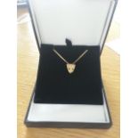 14 carat yellow gold necklace with panther head pendent