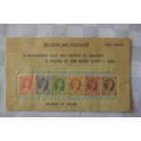 A collection of 6 Rhodesian & Nyasland stamps in a sealed envelope.