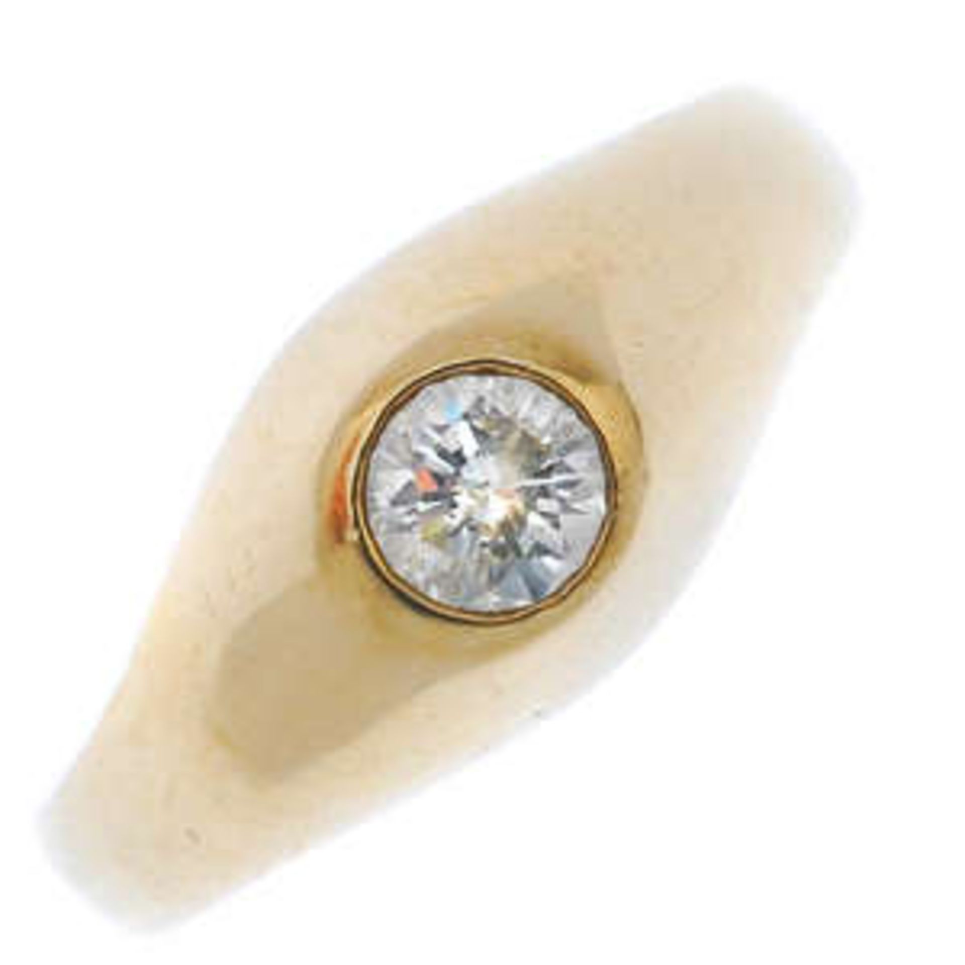A diamond single-stone ring. The brilliant-cut diamond within a collet setting, to the tapered