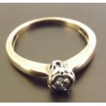 A single stone diamond solitaire ring, a brilliant cut single stone diamond of around .25 carats set