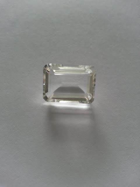 7.90 ct octagon-facet natural brazilian white quartz gemstone measures 14 x 10 mm