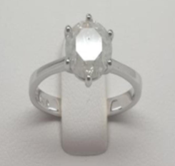 A 1.5 Carat Solitaire Diamond Set in 14k white gold. A single stone set in a classic siz claw