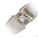 A diamond single-stone 14K White gold ring. The brilliant-cut diamond, within a square-shape