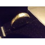 A gentlemans single stone ring, a brilliant cut diamond set in 9 carat gold 2gms