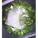 A 1.54 carat round single yellow diamond, as seen through a 30x scope