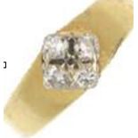 A stunning 4 stone 18 carat gold cluster ring, Four round brilliant cut diamonds, set in a diamond