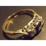 A three stone, saphire and diamond ring, single square cut ring, with two diamonds set to either