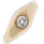 A diamond single-stone ring. The brilliant-cut diamond within a collet setting, to the tapered